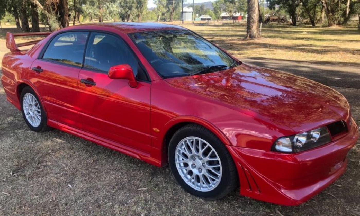 2002 Mitsubishi Magna Ralliart TJ red images build number 0037 (1).JPG