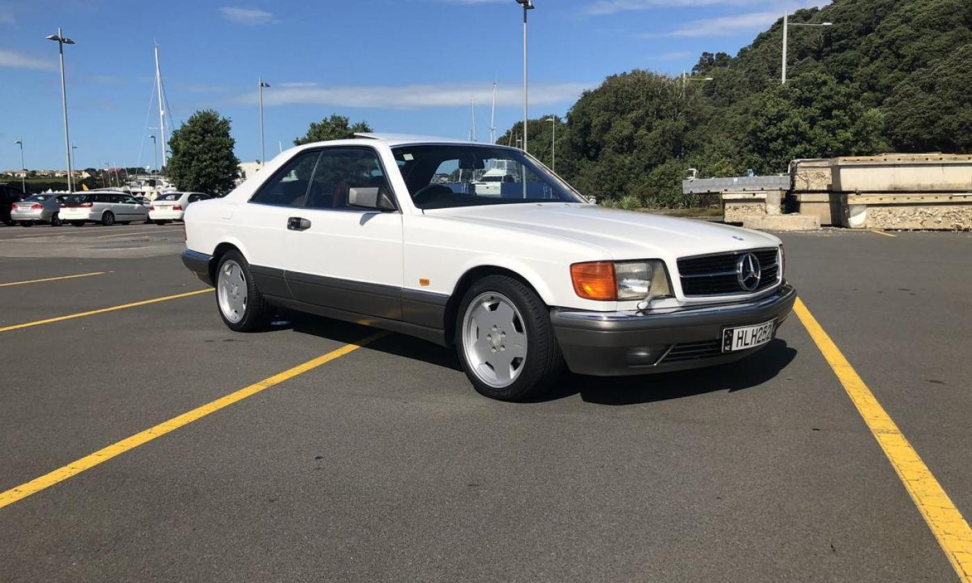 Mercedes 560SEC white on grey with maroon interior images (1).jpg