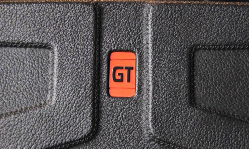242 GT steering wheel red badge image.png