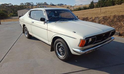Datsun 180B SSS 610 hardtop Bluebird white paint image.jpg