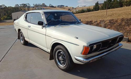 Datsun 180B SSS 610 hardtop coupe white paint.jpg