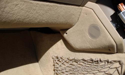 Mercedes C140 1997 interior carpet storage net in passenger footwell phone mount.jpg