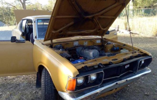 1974 Datsun 180B SSS Coupe in burnt Orange images unrestored (3).JPG