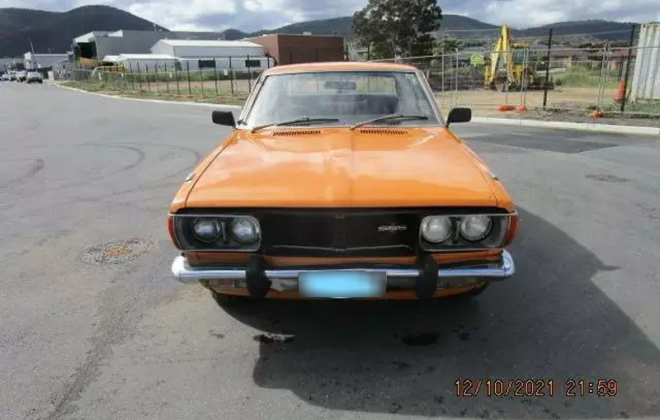 1974 Datsun 610 180B SSS orange hardtop coupe  front grille (8).png