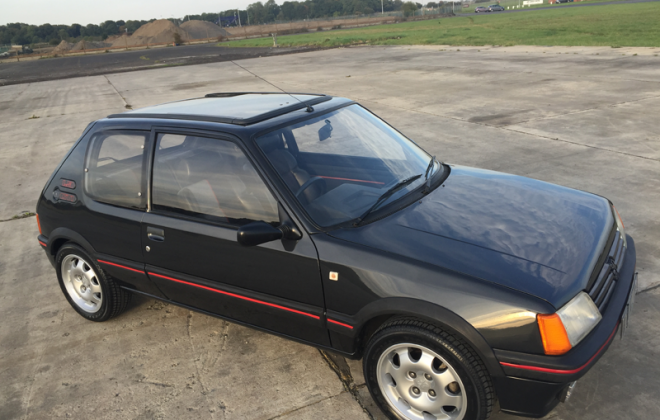 1987 205 GTI with slide back sunroof.png