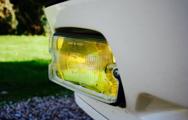 205 GTI Siem driving lights with yellow reflector.png