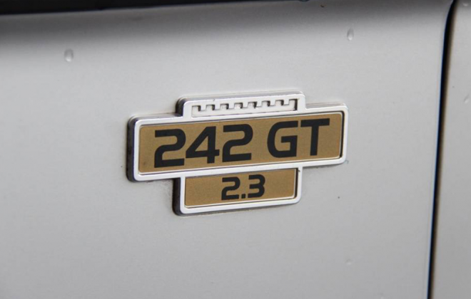 242 GT 2.3 fender badge copy.png
