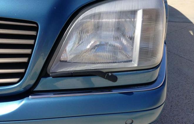 C140 Aquamarine blue headlight with windscreen washer coupe Mercedes.jpg