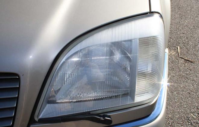 C140 mercedes headlight wiper.jpg