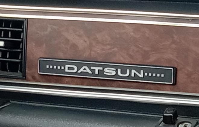 Datsun 180B SSS 610 coupe bluebird dashboard badge.jpg