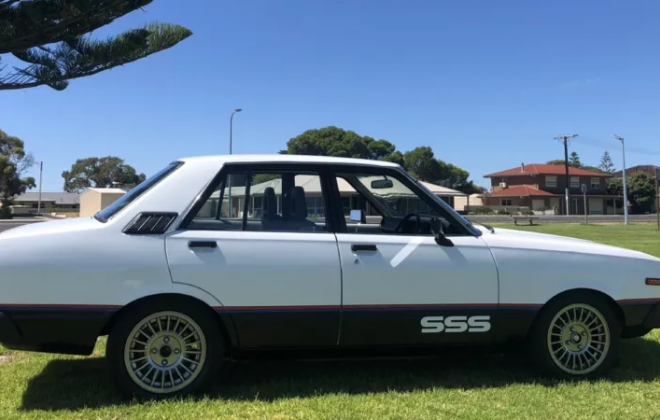 Datsun Stanza SSS Sedan white on black Australia 2021 (1).png
