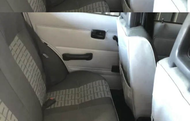 Datsun Stanza SSS Sedan white on black Australia 2021 (3).png