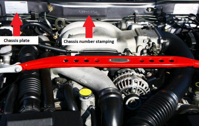 FD RX7 engine bay showing chassis number locations.png