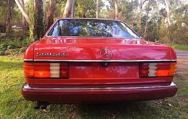 Mercedes 560SEC C126 classic Signal red over burgundy images (7).jpg