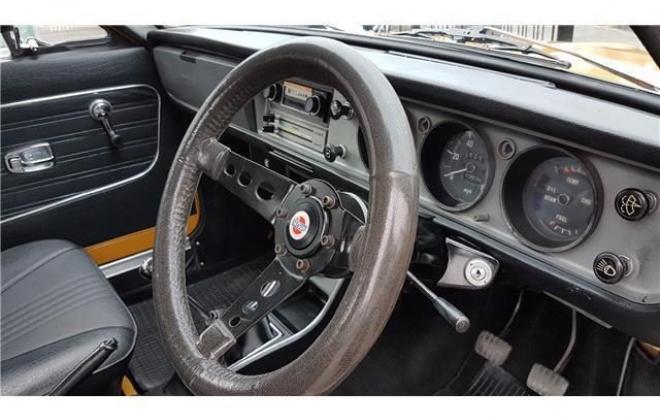 Orange 1971 Datsun 1200 coupe original restored images (16).jpg