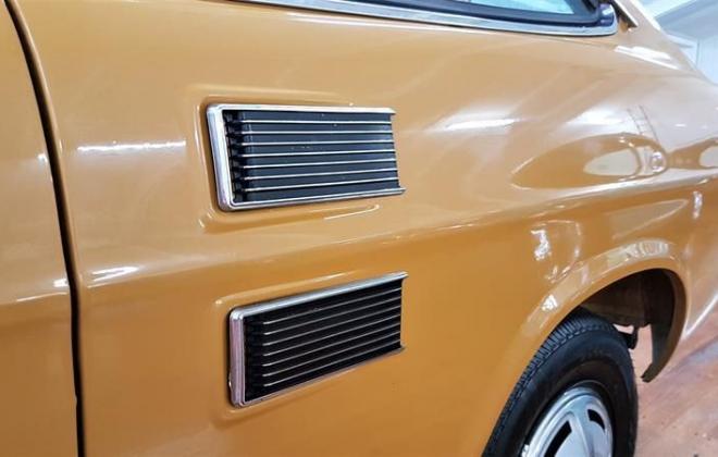Orange 1971 Datsun 1200 coupe original restored images (2).jpg