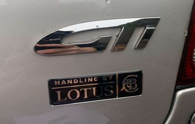 Satria GTi Rear badge early GTi Lotus badge.png