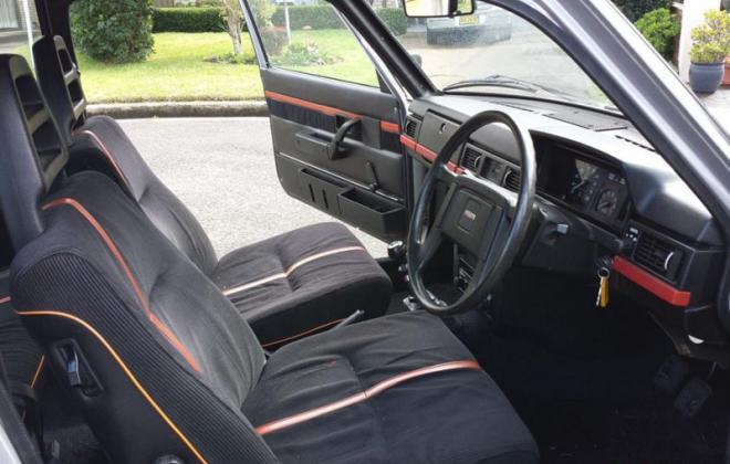Volvo 242 GT red and black interior image.jpg