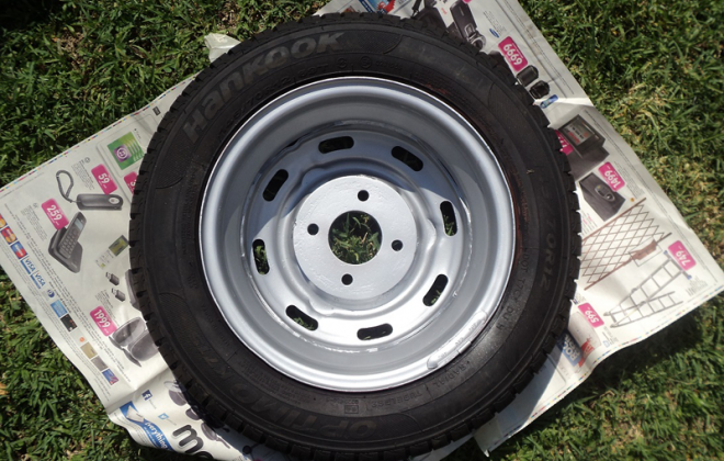 Wheel with backing plate Leyland Mini GTS south africa.png