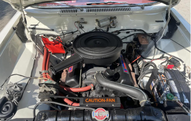 White Studebaker Daytona engine bay 1965.png