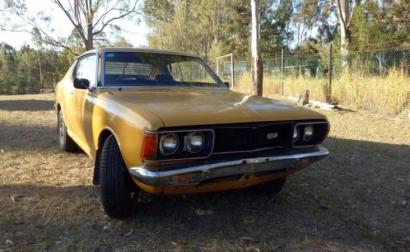 1974 Datsun 180B SSS Coupe in burnt Orange images unrestored (2).JPG