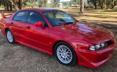 2002 Mitsubishi Magna Ralliart TJ red images build number 0037 (1).JPG