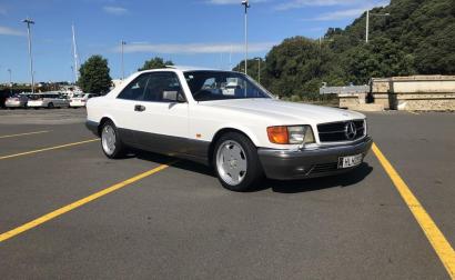 Mercedes 560SEC white on grey with maroon interior images (1).jpg